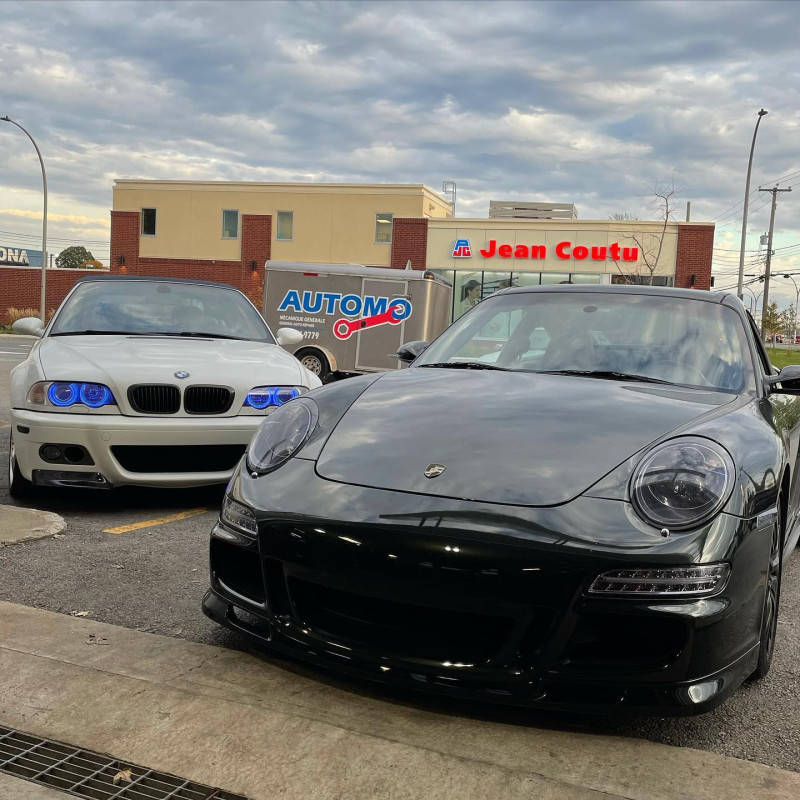 Custom performance cars parked side by side.